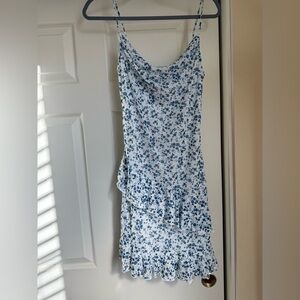 Blue floral, brown floral, and knitted blue dresses